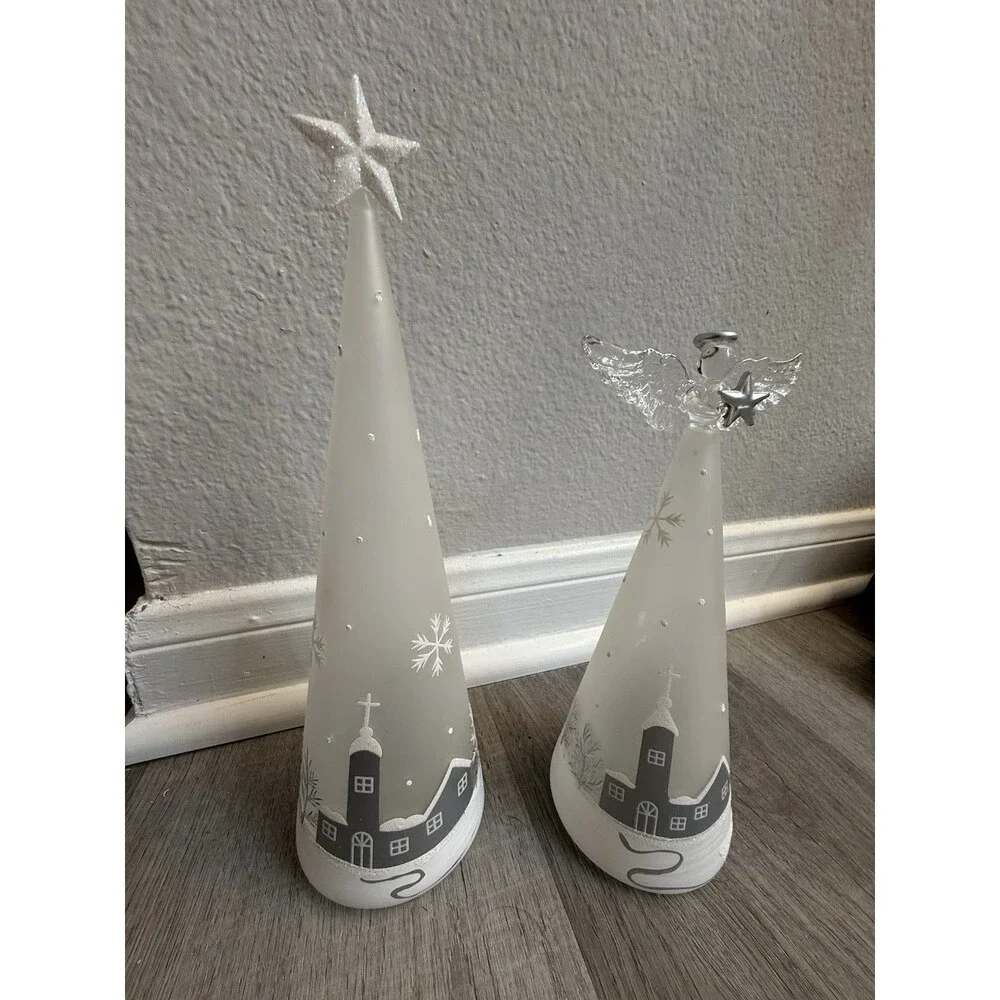Christmasy frosted glass decorated with a white snowy village scene.